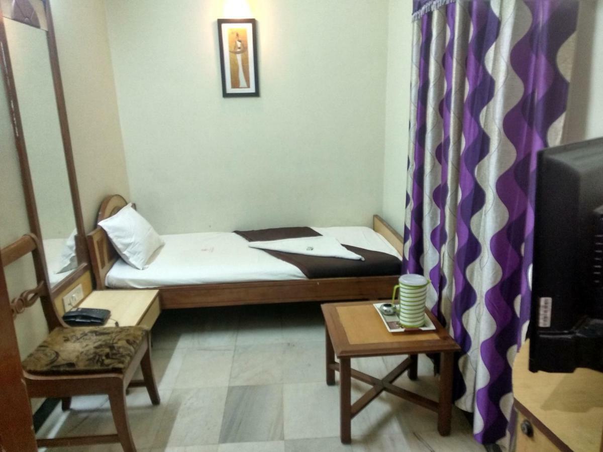 Hotel Rajwada International Belgaum Bagian luar foto